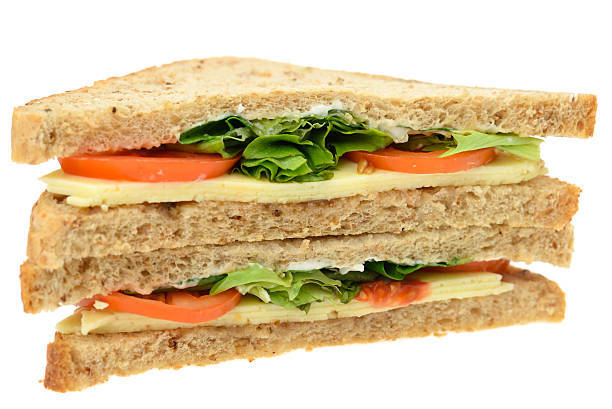 Crispy golden grilled cheese sandwich with melted cheese pull